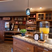 Orange juice dispenser on the counter of the cafe room at The Manor at York Town in Jamison, PA.