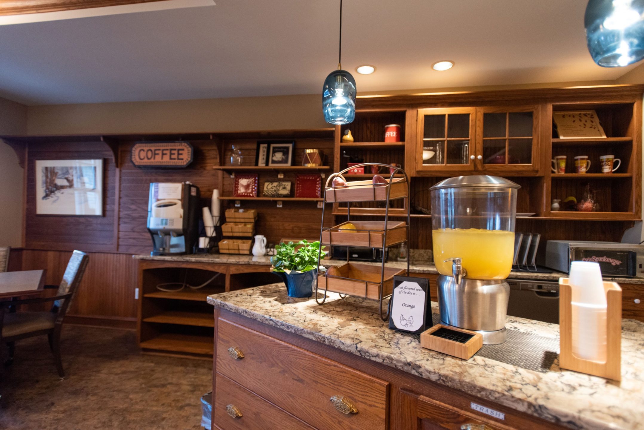 Orange juice dispenser on the counter of the cafe room at The Manor at York Town in Jamison, PA.