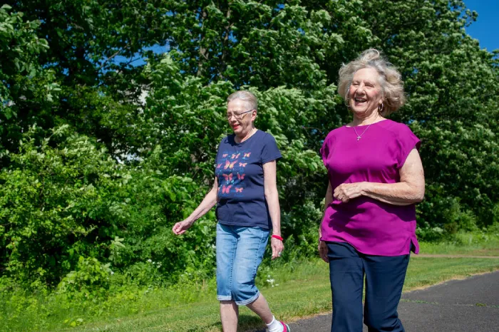 The Manor at York Town residents enjoy a walk in Warwick Community Park in Jamison, PA